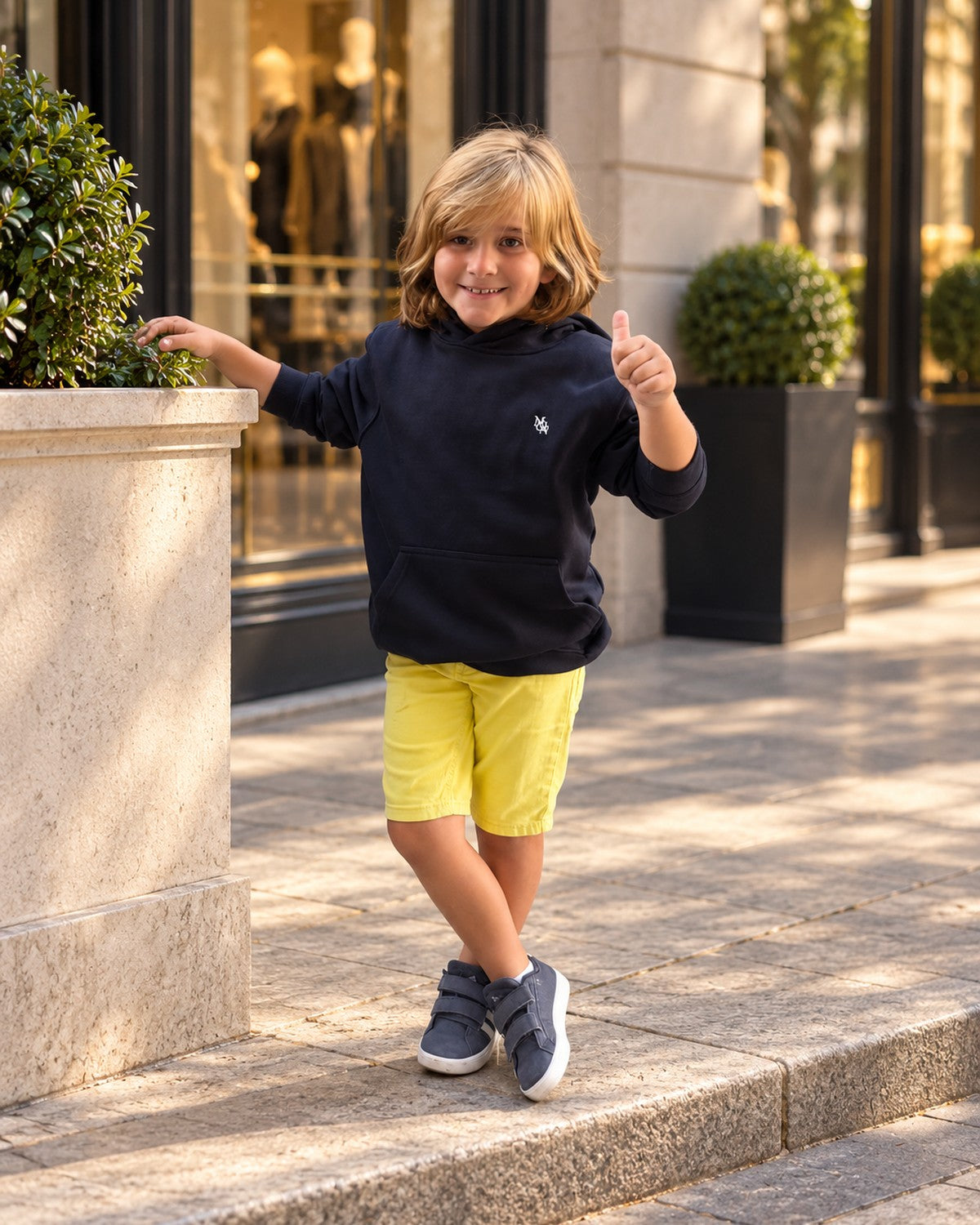 Heritage Navy Junior Hoodie — boy smiling with a thumbs up